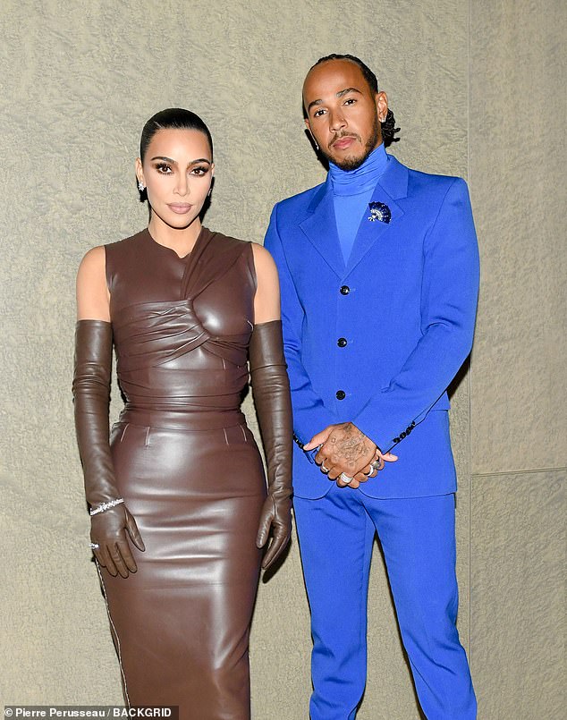 Kim posed for photos in her outfit ahead of the event