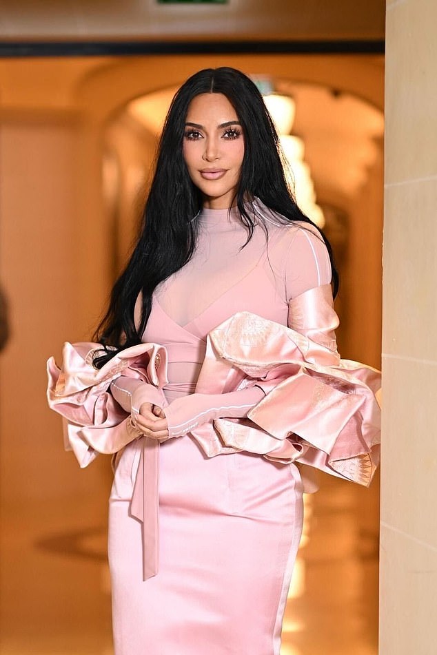 According to reports from The Sun, Kim flew into the UK this week for a romantic weekend away with the Formula 1 ace, 41  (pictured together in 2021)