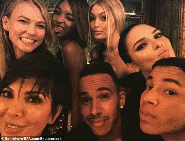 According to reports, Kim flew into the UK this week for a romantic weekend away with the Formula 1 ace, 41  (pictured together in 2021)