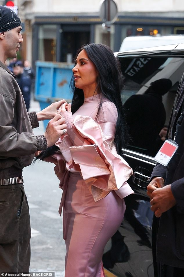 Kim cut a glamorous figure in her all pink outfit