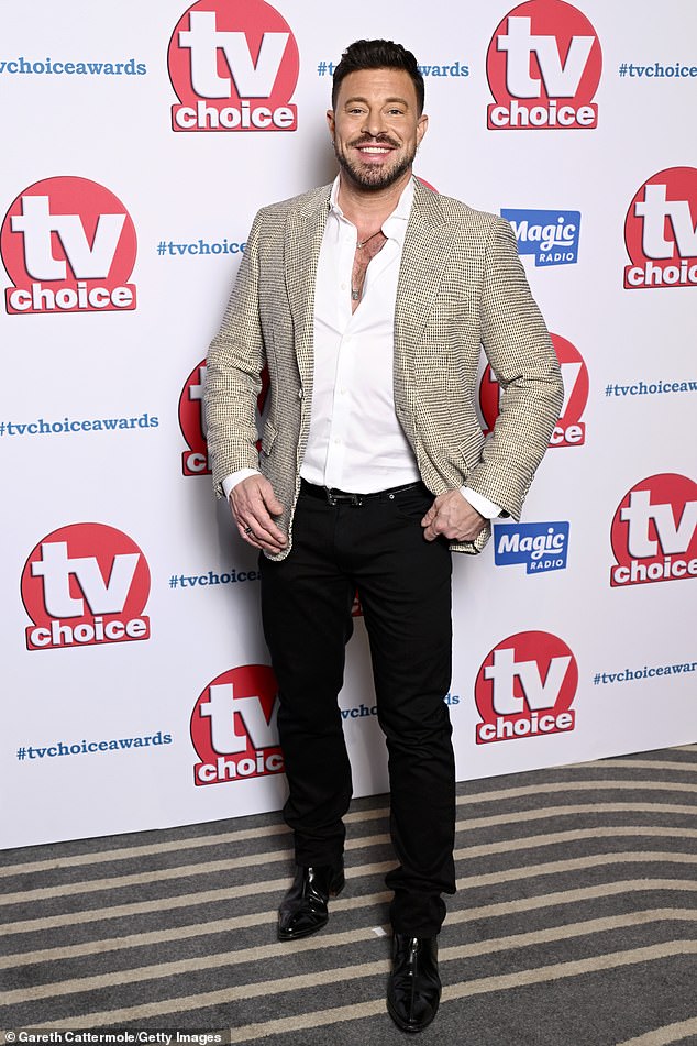 Blue's Duncan James looked dapper as he beamed for the cameras