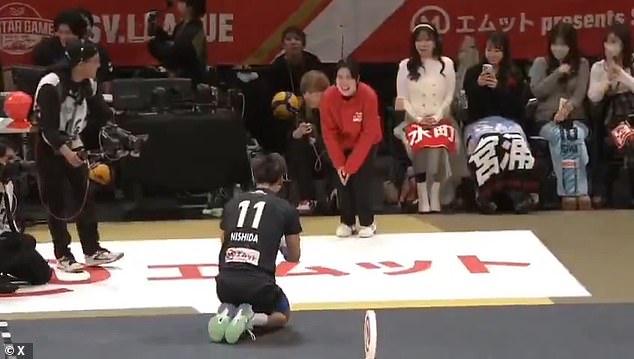 Nishida accidentally hit the female judge after one if his serves veered way left