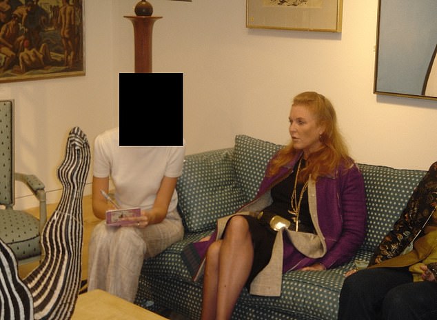 Fergie is pictured in the Epstein files with a mystery woman in an image released at Christmas