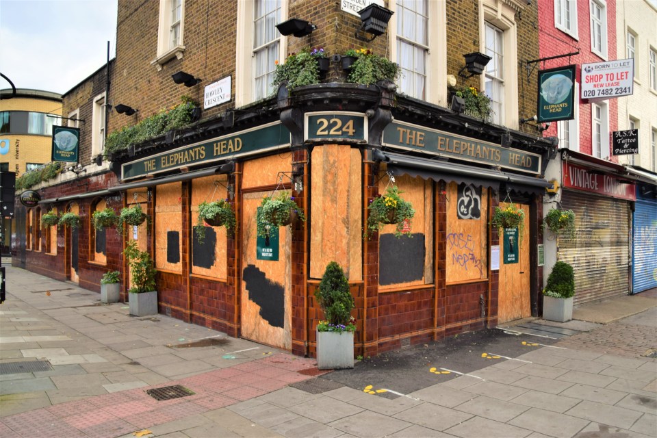 The Elephant's Head pub in Camden, London, boarded up and closed during lockdown.