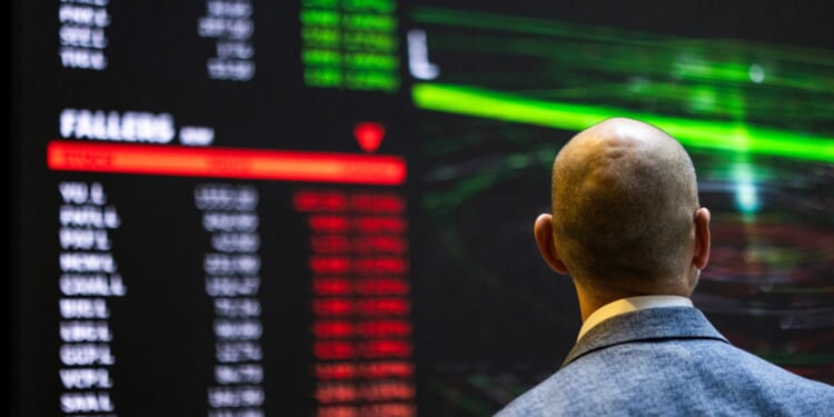 FTSE 100 hits new record as investors piled into UK index’s defensive heavyweights 