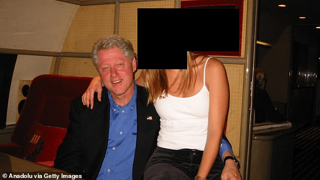 Former president Bill Clinton and an unidentified woman are seen in this image from the Epstein files