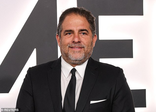 Director Brett Ratner poses at Thursday night's Melania premiere in Washington, D.C., which took place at the newly renamed Trump-Kennedy Center. The next day a photograph of him with Jeffrey Epstein was released by the Department of Justice