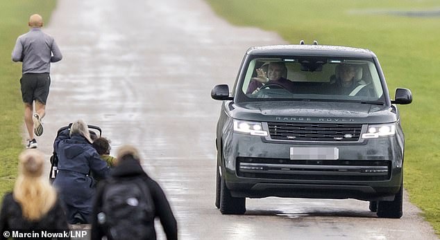 Andrew later went for a drive along The Long Walk in Windsor and waved cheerily to a mother and child as the Epstein files piled more shame on him