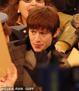 Joseph Quinn, as George Harrison...