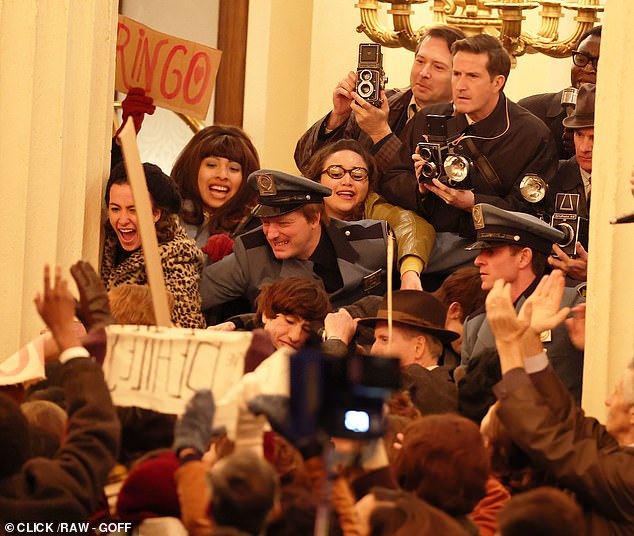 Dressed in matching grey suits, the four stars matched the initial bewilderment felt by The Beatles upon arriving at the New York hotel