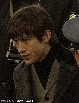 Joseph Quinn looked the part as he filmed his scenes as George Harrison, famously referred to as 'the quiet Beatle'