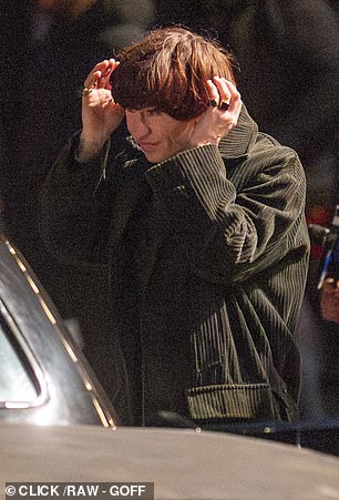 Keoghan was seen tending to his moptop on Sunday evening, the hairstyle made famous by The Beatles in the 1960s