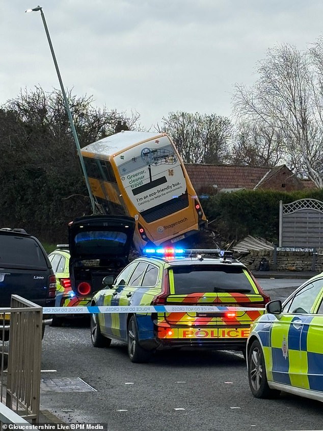 The Stagecoach bus veered off the road and crashed into hedges as it struck a lamp post.