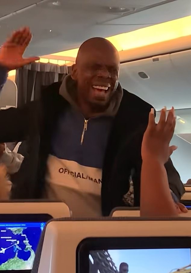Another man (pictured) was videoed loudly preaching to passengers aboard the nine-hour flight from London Heathrow to Jamaica
