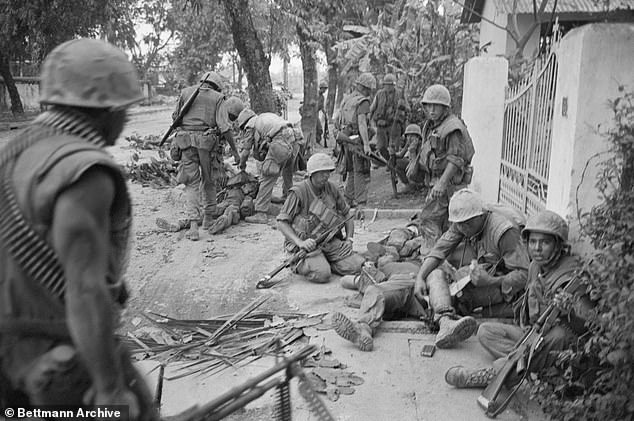 US Marines tend to their wounded during heavy street fighting in Hue after Communist forces invaded South Vietnam in 1968