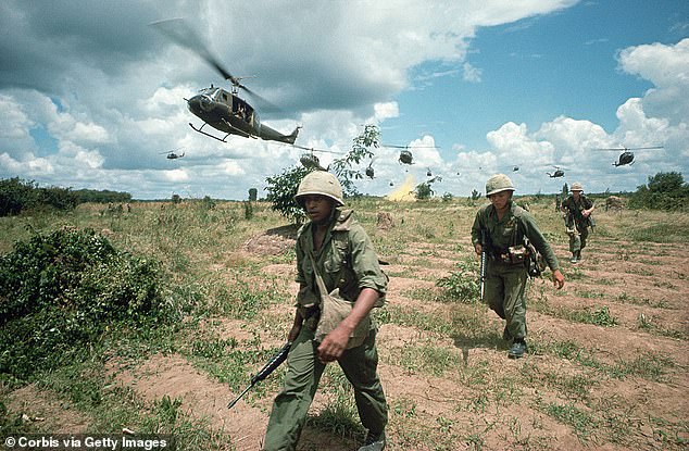 The US 173rd Airborne are supported by helicopters during the Iron Triangle assault, 1968