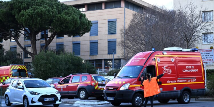 Art teacher, 60, fighting for life after being 'stabbed three or four times by student, 14' in France