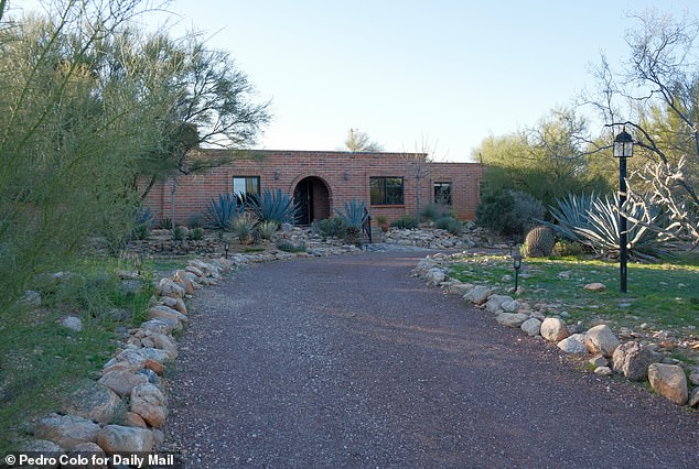 Investigators said Nancy's $1 million home in Tucson, Arizona (pictured on Tuesday) showed signs of forced entry, and forensic teams found blood inside the property
