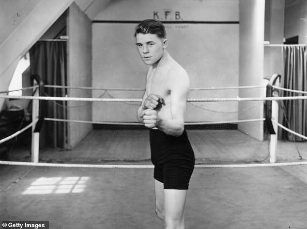 British bantamweight boxer Teddy Baldock is pictured here in sparring pose at Dyers Gymnasium in the Strand in central London on April 3 1927, days before his title-winning fight