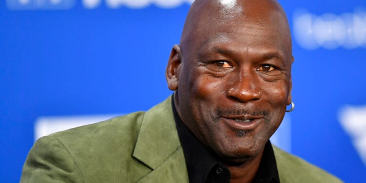Sports trading card signed by basketball legend Michael Jordan sells for eye-watering sum after bidding war