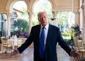 President Donald Trump speaks to the media at Mar-a-Lago Sunday in Palm Beach, Florida.