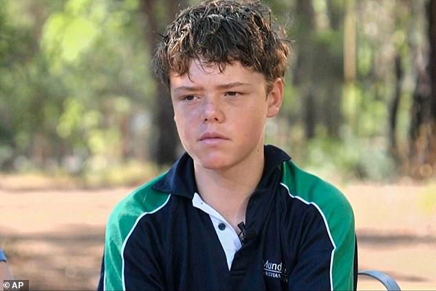 Austin, 13, swam 4km to shore and then sprinted a further 2km to call for help
