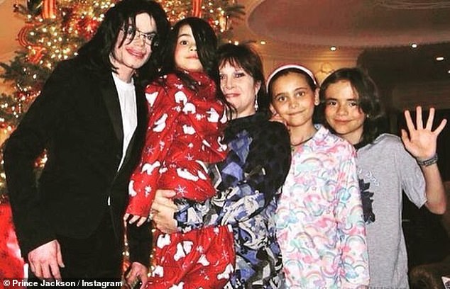Michael Jackson had three children of his own Bigi (center), Paris (right of center) and Prince (right)