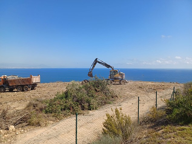 Pictured: Dug up ground and JCB diggers on what was vast green land