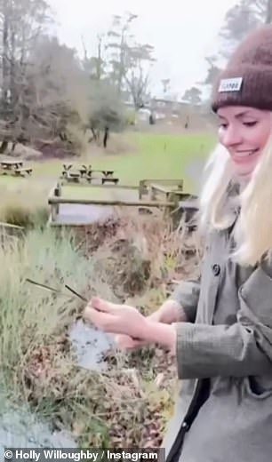 Holly picked up reeds to craft with