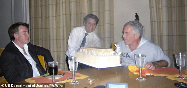 BEST QUALITY AVAILABLE Undated handout photo issued by the US Department of Justice of Lord Mandelson (left) and paedophile financier Jeffrey Epstein (right) and a birthday cake, released in the latest tranche of Epstein files. Issue date: Saturday December 20, 2025. PA Photo. Photo credit should read: US Department of Justice/PA Wire NOTE TO EDITORS: This handout photo may only be used for editorial reporting purposes for the contemporaneous illustration of events, things or the people in the image or facts mentioned in the caption. Reuse of the picture may require further permission from the copyright holder.