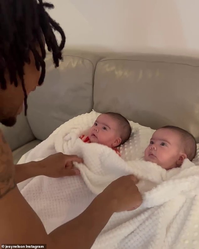 Jesy said of the situation: 'It's not okay, but it is what it is, and I just have to accept it and just try and make the best out of this situation. My girls are the strongest, most resilient babies, and I really believe that they are going to defy all the odds' (pictured with their dad Zion)