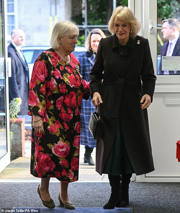 Queen Camilla (pictured right) arriving for her visit to Christ Church Primary School in London