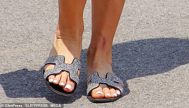 During vacation, she seems to reach for the brand's Oran sandals, which start at $900