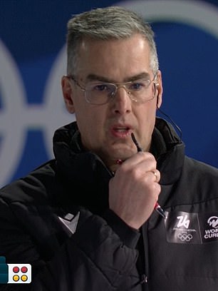 An official was seen in communication with staff with play paused due to the disruption