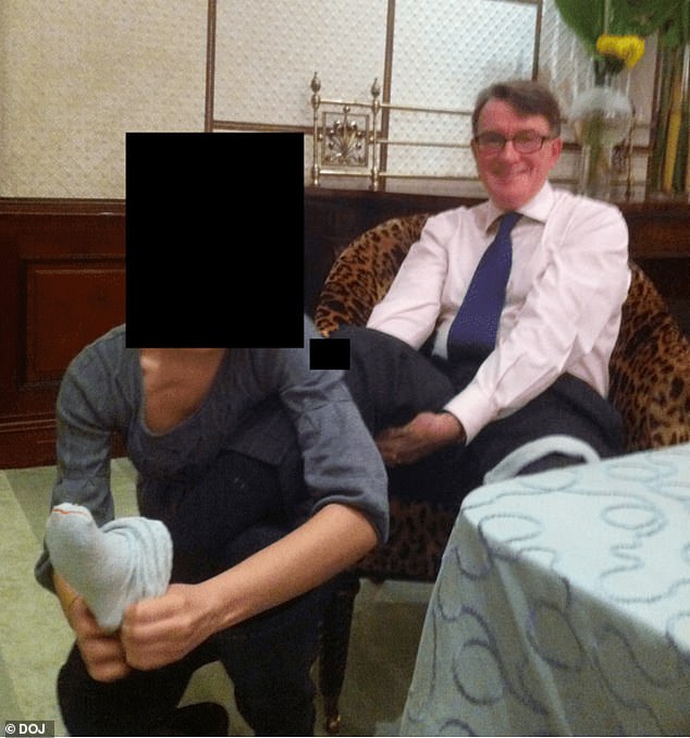 A picture released by the US Department of Justice shows Mandelson with an unidentified individual