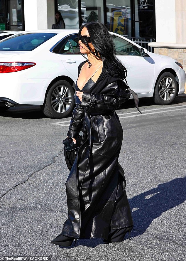 Back in her hometown of Calabasas on Wednesday, Kardashian looked runway-ready, turning heads in a black leather ensemble featuring a tiny top layered under a leather coat