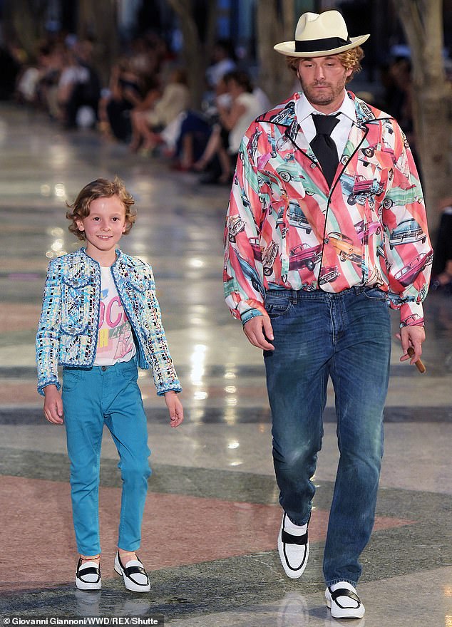 Hudson Kroenig and Brad Kroenig on the catwalk of the Chanel fashion show in 2016. The pair also inherited part of Lagerfeld's estate