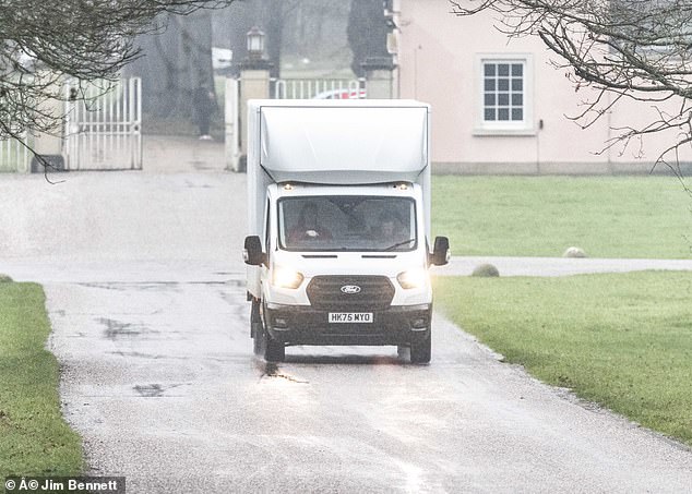 A removals van leaving Royal Lodge last night. The former Duke of York was told to leave his stately home earlier than expected after his brother King Charles became increasingly concerned by allegations made against him