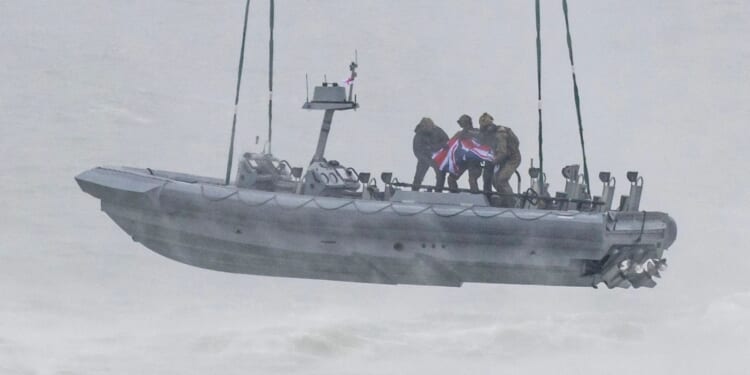 Special Forces in spectacular show of force in Channel as they attach speedboat to Chinook during training exercise