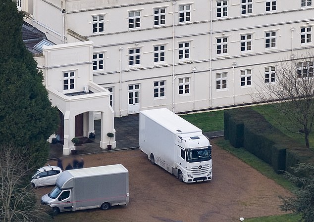 Removal vans are parked at the front of Royal Lodge in Berkshire on Wednesday