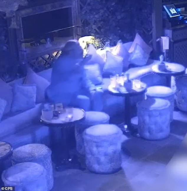 He dips the straw into the target drink and gives it a stir before having a taste of the residue