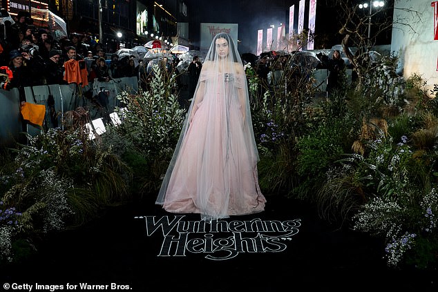 Channelling the passionate heroine Catherine Earnshaw, Charli arrived in a dusky pink gown with a matching bridal veil