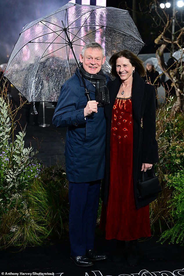 Martin Clunes were joined by his wife Philippa Braithwaite as they arrived for the rain-soaked premiere together