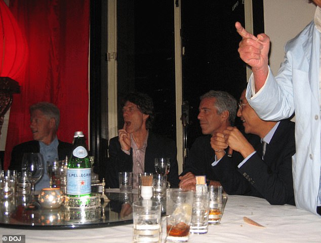 Mick Jagger pictured between Bill Clinton and Jeffrey Epstein in a restaurant