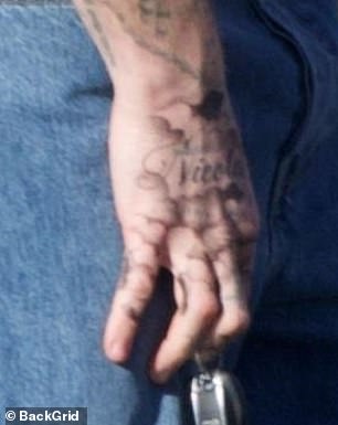 It also appears that Brooklyn has begun to remove his tattoo tributes to his siblings Romeo and Cruz, as a thick line was visible on his ring and middle fingers