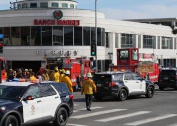 At least three dead and six injured after driver hits cyclist and crashes car into Los Angeles supermarket