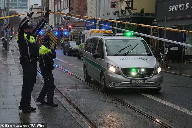 Dramatic video footage from the scene shows people screaming and rushing to try and help those trapped beneath the bus, as sirens wail in the background