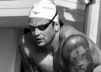 Adam Peaty unveils new tattoo during honeymoon with wife Holly after Gordon reveals he calls him 'dad' amid family feud