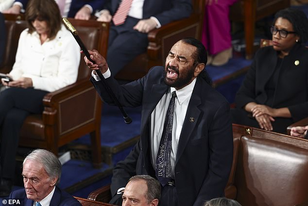 Democratic Congressman Al Green of Texas interrupts President Trump's address to a joint session of the United States Congress at the US Capitol on March 4 last year