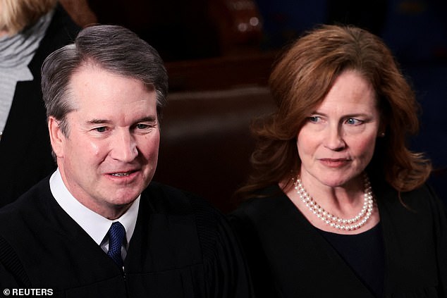 Justice Amy Coney Barrett – a Trump-appointee – remained stone-faced as the president ripped into the majority decision that she joined